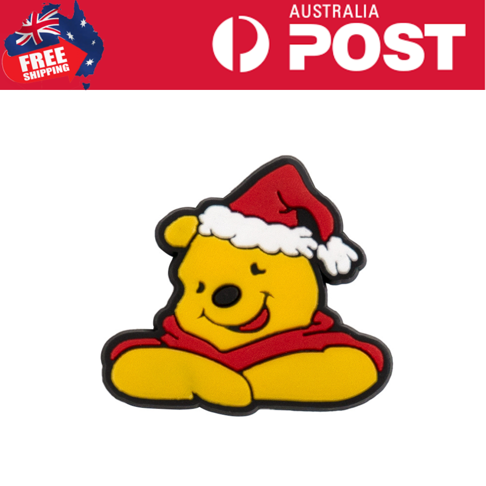 Winnie the Pooh wearing a Santa hat and red scarf, festive Christmas character accessory.