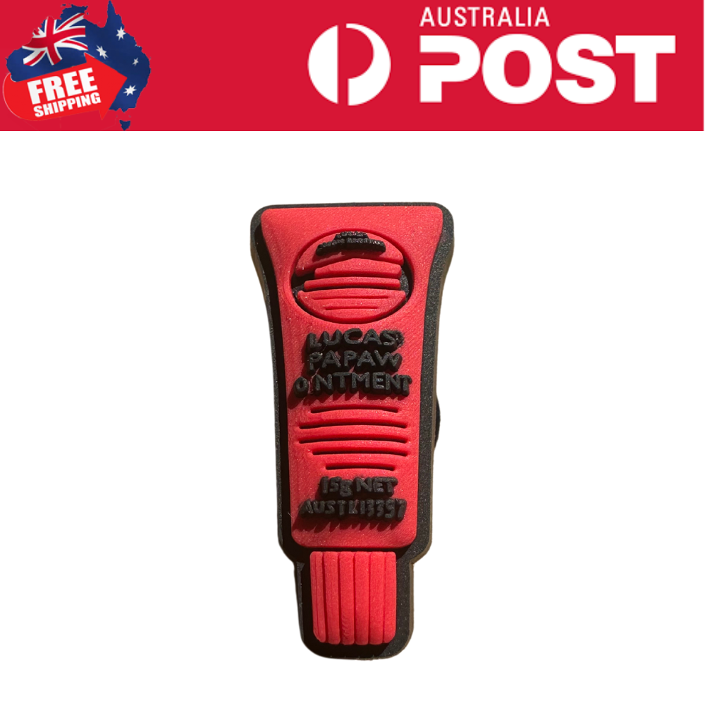 Red Lucas Papaw Ointment keychain accessory, novelty item for fans of the famous medicinal balm.
