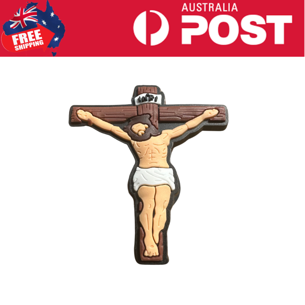 Crucifix chocolate with Jesus figure, religious religious candy Easter decoration.