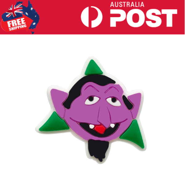 Purple cartoon vampire character magnet with green accents, fun Halloween home decor.