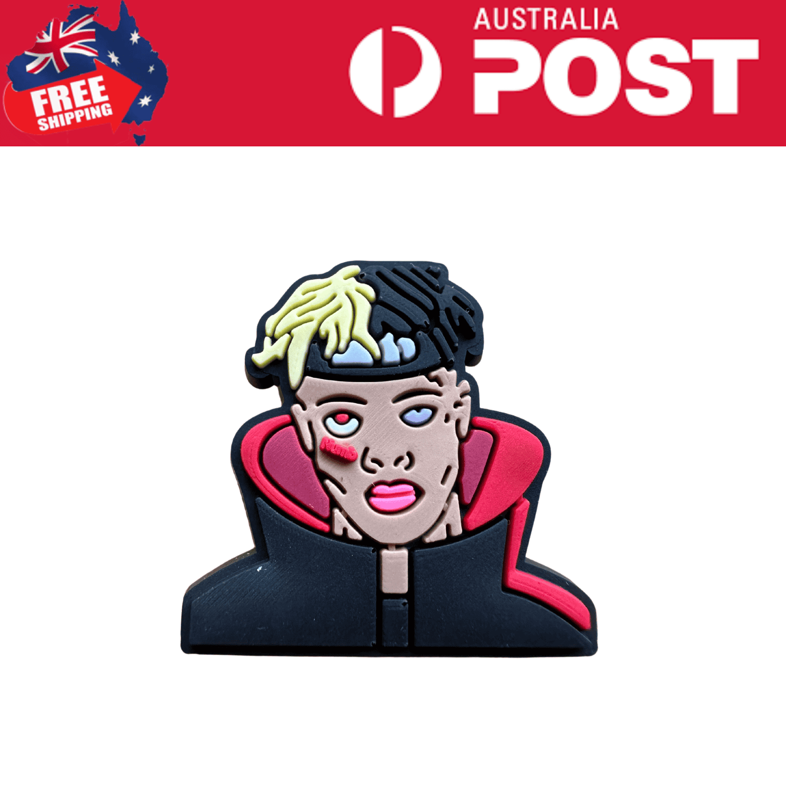 Bright enamel pin of a person with dyed hair, edgy makeup, and a hoodie; perfect for streetwear or music fans.