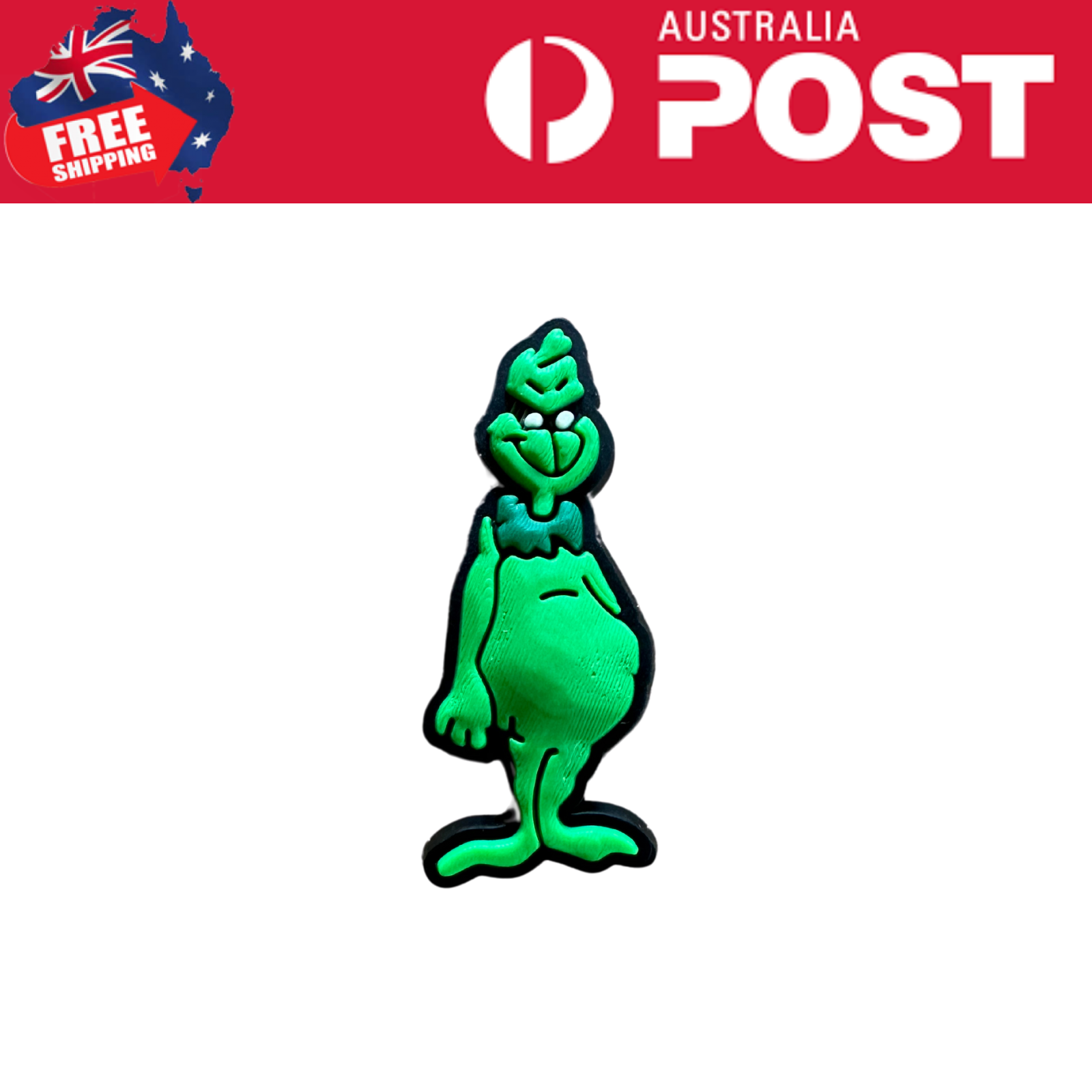 Glow-in-the-dark grinch-shaped enamel pin for Christmas and festive accessories.