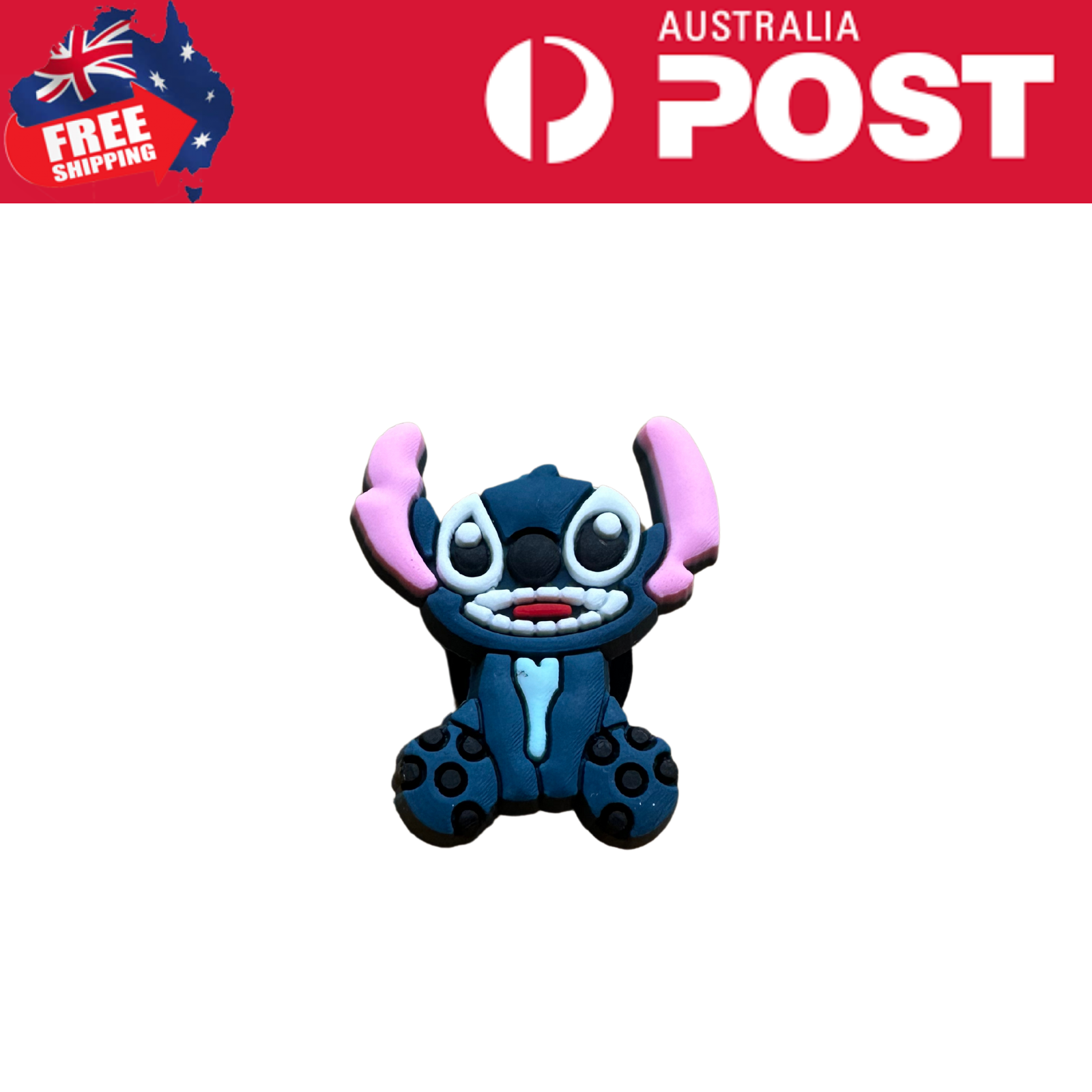 Cute cartoon creature made of polymer clay, blue with pink ears, big eyes, and a cheerful expression.