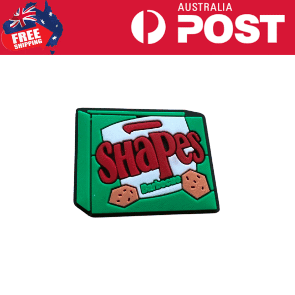Colorful rubber magnet shaped like a handbag with the word "Shapes" and biscuit illustrations, ideal for kids' educational decor.