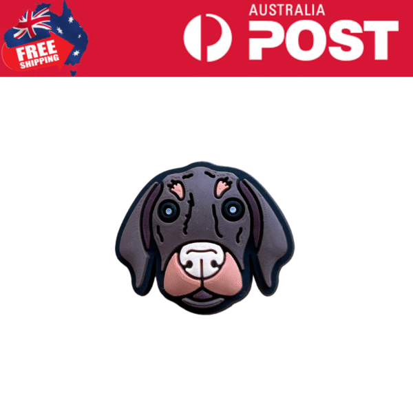Colorful dog face rubber pin, perfect for accessories and clothing embellishments.