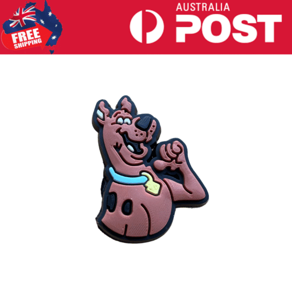 Colorful rubber cartoon dog patch with smile and collar for accessories, clothing, or bags.
