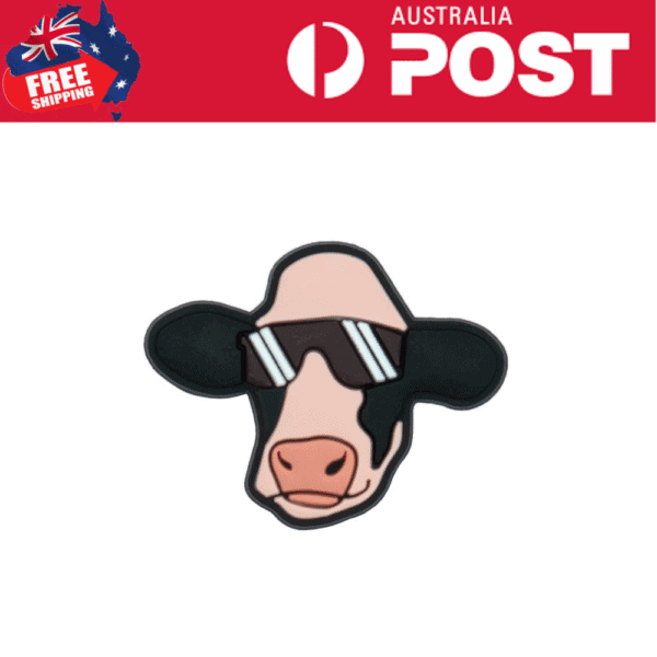 Cute cow pin wearing sunglasses, trendy accessory for fashion and animal lovers.