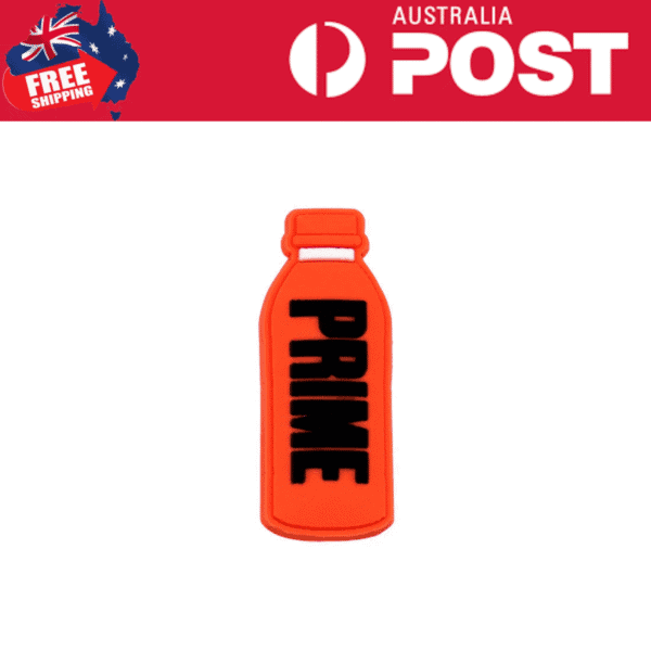 Orange silicone keychain with black "PRIME" text, first aid bottle shape, novelty accessory, PPE, safety, emergency preparedness, PPE supplies, protective gear.