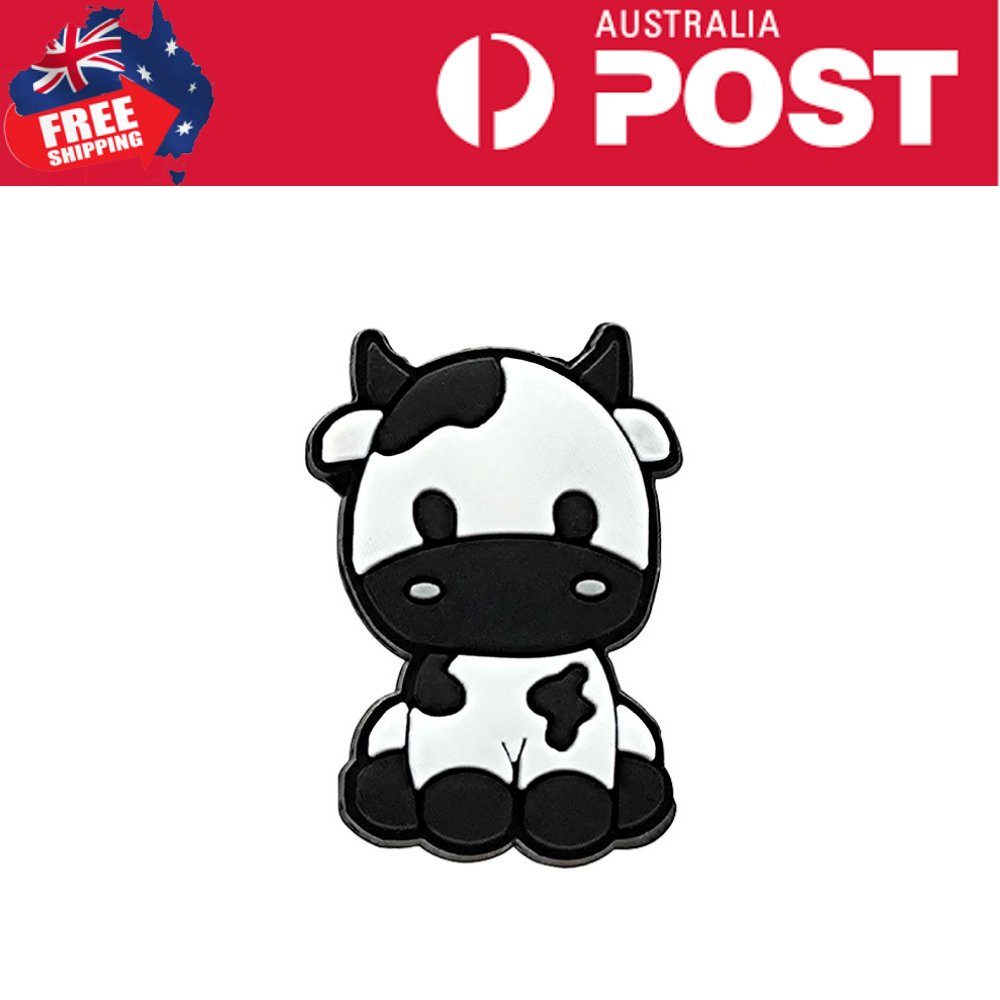 Cute black and white cow plush keychain, perfect for animal lovers and kids.