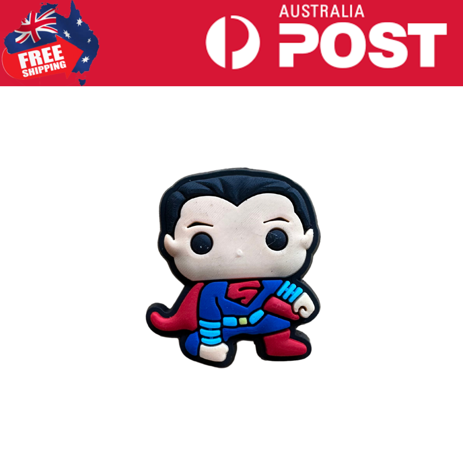 Colorful Superman plush keychain or toy figure with iconic costume and pose.