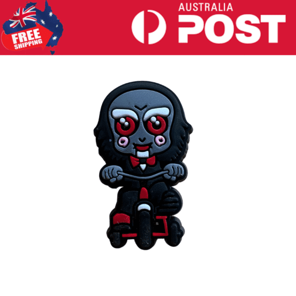 Cute zombie clown figurine riding a scooter, Halloween themed collectible, black red gray details.
