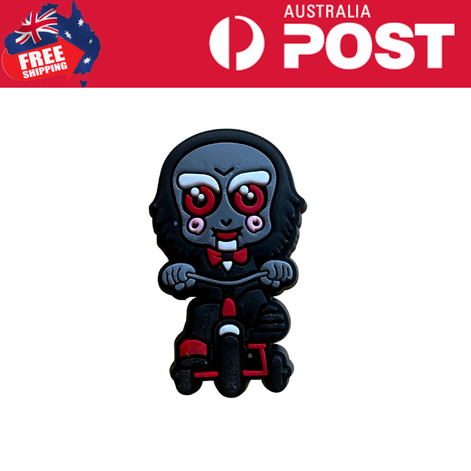 Cute zombie clown figurine riding a scooter, Halloween themed collectible, black red gray details.