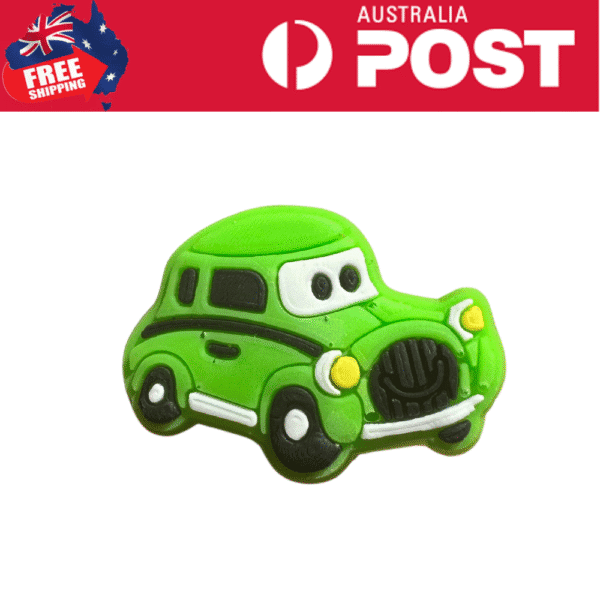 Green toy car with cartoon face, children’s dessert decoration, cute lime green sweet treat, kids party edible, Mr. Charms confectionery.