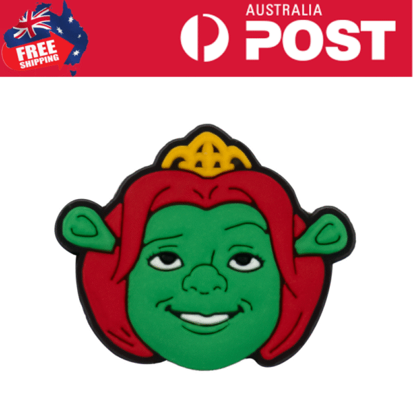 Bright green goblin face enamel pin with red hair and a yellow crown on top. Perfect for cosplay or collectible accessories.