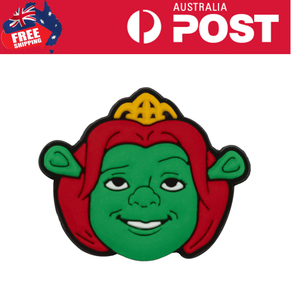 Bright green goblin face enamel pin with red hair and a yellow crown on top. Perfect for cosplay or collectible accessories.