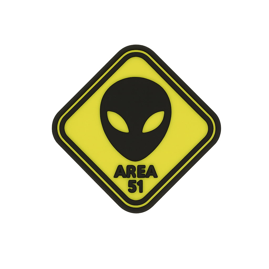 Alien head patch with "AREA 51" text in black on neon yellow background.