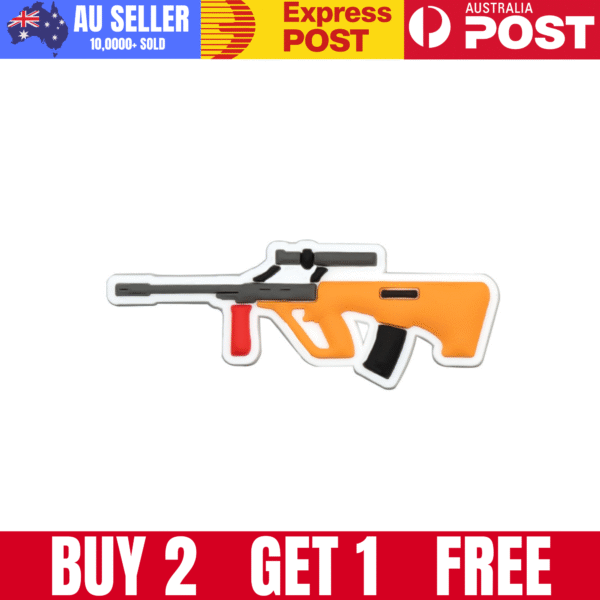 Bullet toy gun keychain, orange and black, fun accessories for kids and collectors.